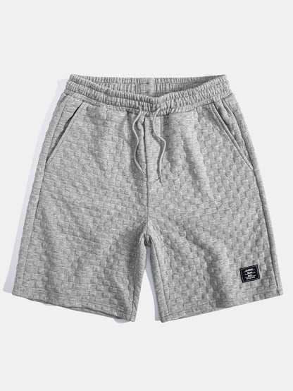Kariertes Jacquard-T-Shirt mit Kapuze und abgerundetem Saum & Karierte Jacquard-Shorts